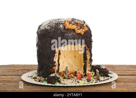 Crèche en forme de Panettone sur table en bois. Banque D'Images