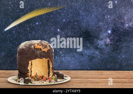 Crèche en forme de Panettone sur table en bois. Banque D'Images