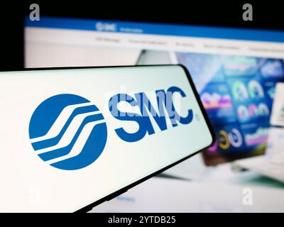 Allemagne. 19 juillet 2024. Dans cette illustration photo, un téléphone portable avec le logo de la société japonaise de machines SMC Corporation est vu devant le site Web de l'entreprise. (Crédit image : © timon Schneider/SOPA images via ZUMA Press Wire) USAGE ÉDITORIAL SEULEMENT ! Non destiné à UN USAGE commercial ! Banque D'Images