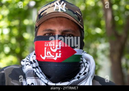 Manifestant lors d'un rassemblement pro-palestinien à Melbourne, Victoria, Australie Banque D'Images