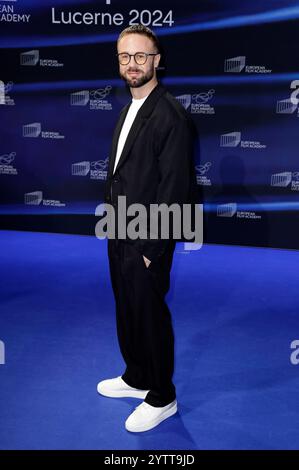 Andrei Gnyot BEI der Verleihung des 37. Europäischen Filmpreises 2024 im Kultur- und Kongresszentrum Luzern. Lucerne, 07.12.2024 *** Andrei Gnyot lors de la présentation 37 des European film Awards 2024 au Lucerne culture and Convention Center Lucerne, 07 12 2024 Foto:xs.xGabschx/xFuturexImagex efa 4265 Banque D'Images