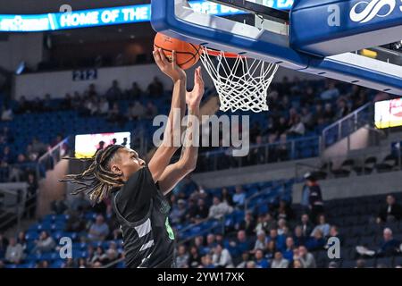 St Louis, États-Unis. 08 décembre 2024. 08 DÉCEMBRE 2024 : Greg Spate (0), garde des Cougars de Chicago State, lance un tir pour un panier dans un match de saison régulière où les Cougars de Chicago ont visité les Billikens de Saint Louis. Tenue à la Chaifetz Arena à formé Louis, MO le dimanche 08 décembre 2024 Richard Ulreich/CSM crédit : CAL Sport Media/Alamy Live News Banque D'Images