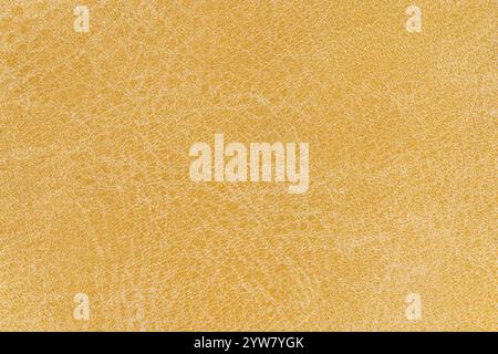 Motif textile abstrait de couleur jaune pâle pour le fond. Vue de dessus macro-photographie de détail gros plan du matériau de tissu de niveau de surface de couleur moutarde, Banque D'Images