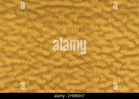 Velours jaune ou velours avec un fond de texture moelleux et doux à poil court. Vue de dessus de macro-photographie de détail en gros plan du matériau en tissu de couleur jaune, Banque D'Images