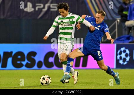 Zagreb, Croatie. 10 décembre 2024. Zagreb, Croatie, 10 décembre 2024 : Reo Hatate du Celtic (l) en action contre Lukas Kacavenda du Dinamo Zagreb (R) lors de la Ligue des Champions de l'UEFA, phase de Ligue, match entre le Dinamo Zagreb et le Celtic au stade Maksimir, Zagreb, Croatie. (Igor Kupljenik/SPP) crédit : SPP Sport Press photo. /Alamy Live News Banque D'Images