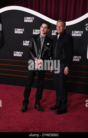 Hollywood, Californie, États-Unis 10 décembre 2024 L'acteur et producteur Timothee Chalamet et le PDG de Disney Bob Iger assistent à la première mondiale de A Complete Unknown à Searchlight Pictures au Dolby Theatre le 10 décembre 2024 à Hollywood, Californie, États-Unis. Photo de Barry King/Alamy Live News Banque D'Images