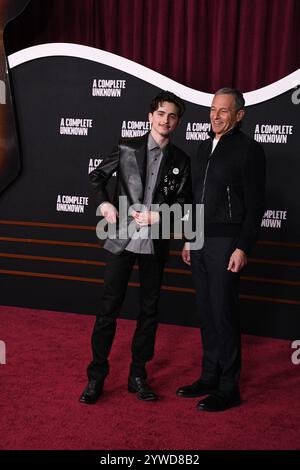 Hollywood, Californie, États-Unis 10 décembre 2024 L'acteur et producteur Timothee Chalamet et le PDG de Disney Bob Iger assistent à la première mondiale de A Complete Unknown à Searchlight Pictures au Dolby Theatre le 10 décembre 2024 à Hollywood, Californie, États-Unis. Photo de Barry King/Alamy Live News Banque D'Images