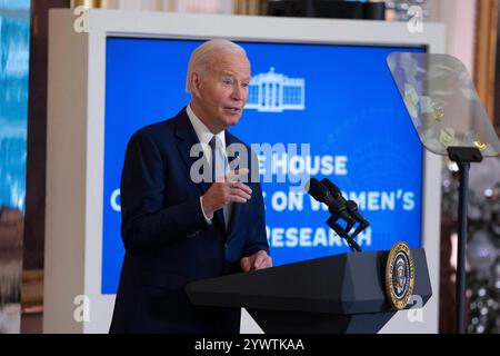 Washington, États-Unis. 11 décembre 2024. Le président des États-Unis Joe Biden prononce une allocution lors de la Conférence de la Maison Blanche sur la recherche en santé des femmes à la Maison Blanche à Washington, DC, États-Unis, le 11 décembre 2024. Photo de Chris Kleponis/CNP/ABACAPRESS. COM Credit : Abaca Press/Alamy Live News Banque D'Images