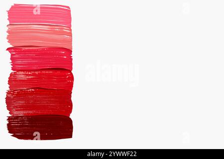 Composition de frottis de rouge à lèvres dans différentes nuances sur un fond clair. Produit de beauté, textures riches et vibrantes. Banque D'Images