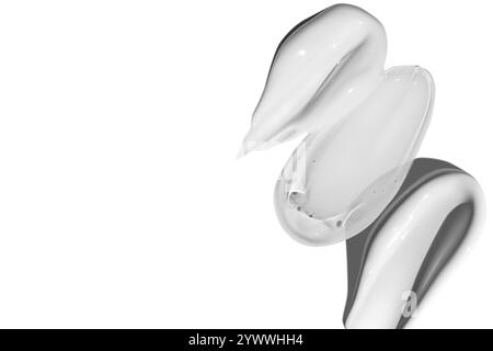 Composition de frottis de crème blanche et de frottis de gel transparent sur un fond vide. Produits de soin de la peau, textures hydratantes et hydratantes. Banque D'Images