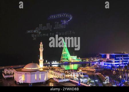 Djeddah, Arabie Saoudite. 11 décembre 2024. Les drones se présentent à célébrer alors que le Congrès de la FIFA vote pour les droits d’accueil de la Coupe du monde 2034, l’Arabie saoudite étant la seule candidate, sur le Yacht Club, à Djeddah et Dammam, le 11 décembre 2024. Photo Balkis Press/ABACAPRESS. COM Credit : Abaca Press/Alamy Live News Banque D'Images