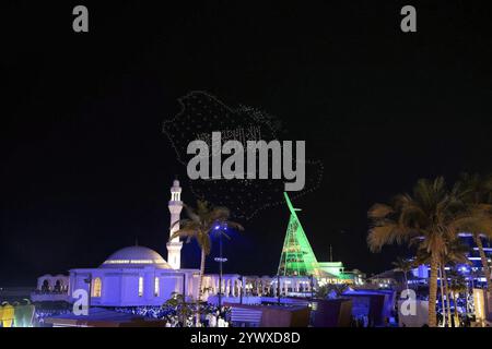 Djeddah, Arabie Saoudite. 11 décembre 2024. Les drones se présentent à célébrer alors que le Congrès de la FIFA vote pour les droits d’accueil de la Coupe du monde 2034, l’Arabie saoudite étant la seule candidate, sur le Yacht Club, à Djeddah et Dammam, le 11 décembre 2024. Photo Balkis Press/ABACAPRESS. COM Credit : Abaca Press/Alamy Live News Banque D'Images