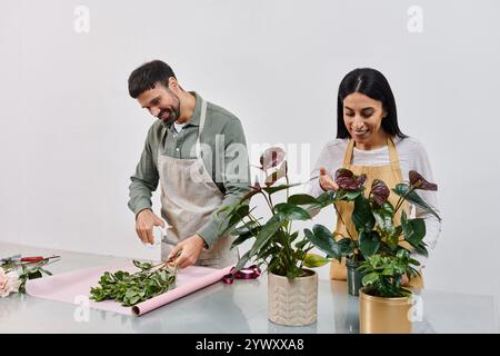 Un fleuriste habile créant des arrangements floraux, mettant en valeur des plantes dans leur boutique. Banque D'Images