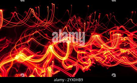 Motifs abstraits de lumière ondulée créés par de nombreuses petites sources de lumière avec la photographie à longue exposition Banque D'Images