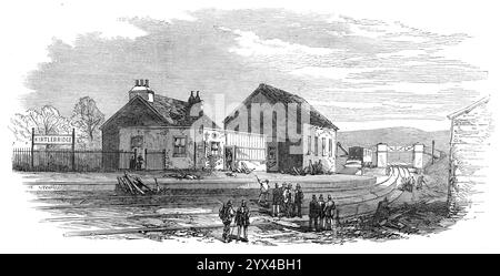 Scène de l'accident ferroviaire à Kirtlebridge, Dumfries, [Écosse], 1872. Un conducteur de moteur et dix passagers ont été tués et beaucoup ont été blessés... un train minier de Carlisle... est arrivé à la gare de Kirtlebridge devant le train express... les hommes en charge du train minier ont dû déposer quelques wagons à Kirtlebridge, et à cette fin, ils ont détourné leur train de la ligne descendante à la ligne montante... malheureusement, par une erreur, l'homme en charge des points les a tournés de sorte que le train minéral, au lieu de continuer le long de la ligne montante, a été dirigé à travers la route et sur la ligne descendante Banque D'Images