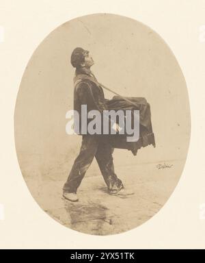Le broyeur d'orgue, vers 1853. Informations complémentaires : dans ce petit portrait ovale, le broyeur d'orgue jette sa tête en arrière comme s'il était perdu dans la musique qu'il joue. Banque D'Images