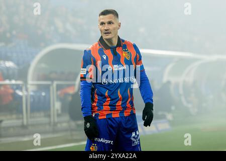 Bâle, Suisse. 14 décembre 2024. Bâle, Suisse, 14 décembre 2024 : Taulant Xhaka (34 Basel) lors du match de Super League entre le FC Basel 1893 et le Grasshopper Club Zurich au Jakob-Park à Bâle, Suisse. Philipp Kresnik (Philipp Kresnik/SPP) crédit : SPP Sport Press photo. /Alamy Live News Banque D'Images