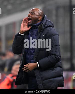 Milan. 15 décembre 2024. Patrick Vieira, entraîneur-chef de Gênes, réagit lors d'un match de football de Serie A entre l'AC Milan et Gênes à Milan, Italie, le 15 décembre 2024. Crédit : Alberto Lingria/Xinhua/Alamy Live News Banque D'Images