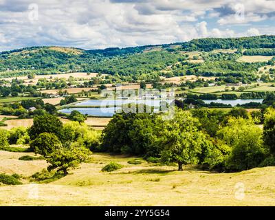 La vue sur Great Witcombe et Witcombe Water près de Birdlip, Gloucestershire. Banque D'Images