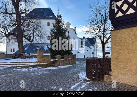 Château de Wolkenstein dans les monts miniers en hiver, Saxe, Allemagne Banque D'Images