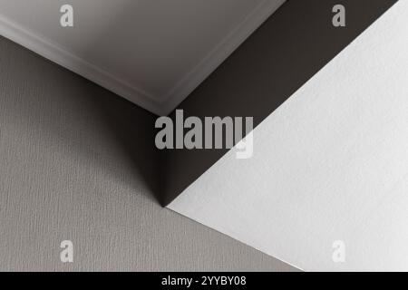 Fond abstrait d'architecture minimale, fragment intérieur avec niche de lumière blanche et mur gris Banque D'Images