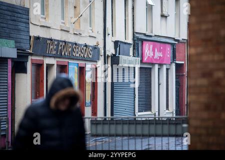 Saltcoats est situé dans le North Ayrshire, qui a certaines des pires privations du Royaume-Uni dans les communautés côtières. La pauvreté dans le North Ayrshire est profondément enracinée et exacerbée par les coupes dans le bien-être social. Certains disent que les conseils et le soutien du Jobcentre local sont incohérents. Banque D'Images