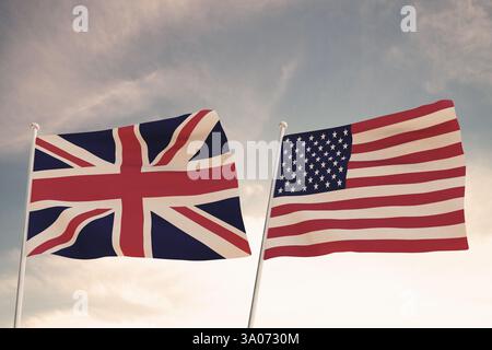 Drapeaux du Royaume-Uni Royaume-Uni ET États-Unis d'Amérique USA ondulant avec fond de ciel bleu nuageux, relations entre pays.rendu 3D. Banque D'Images