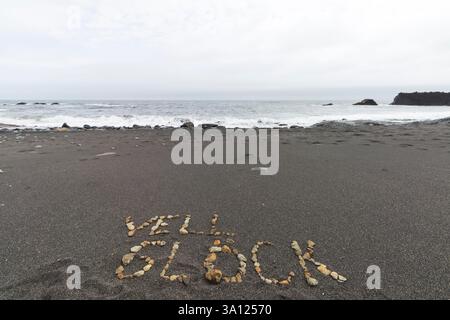 Islande – « bonne chance » écrit dans Sand on the Ground Banque D'Images