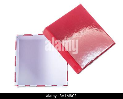 Boîte-cadeau rouge à la main ouverte isolée sur la vue de dessus blanche Banque D'Images