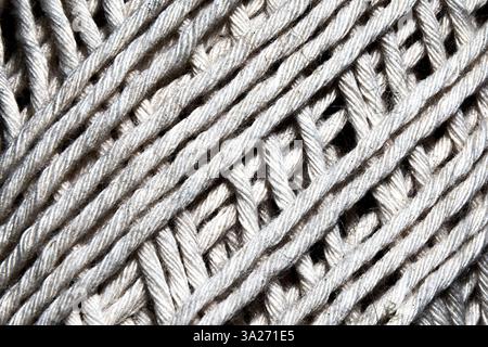 Gros plan sur le tissage à la corde texturée. Macro corde tressée photo. Banque D'Images