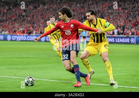 Lille, France. 12 mars 2025. Football : Ligue des Champions, OSC Lille - Borussia Dortmund, éliminatoires, 16e manche, stade Pierre-Mauroy. Ayyoub Bouaddi de Lille en action contre Emre Can. de Dortmund. Crédit : Federico Gambarini/dpa/Alamy Live News Banque D'Images