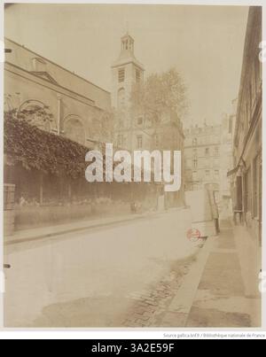 Dans cette image de 1899, Eugène Atget représente l’ancien couvent des Guillemites de la rue des Guillemites, soulignant son importance architecturale et historique à Paris. Banque D'Images