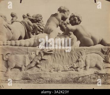 Cette photographie de 1911 d'Eugène Atget se concentre sur un plan détaillé de la sculpture 'le Nil' de Bourdie, située dans le jardin des Tuileries à Paris. L'image met en valeur le savoir-faire artisanal et les détails complexes de la sculpture. Banque D'Images
