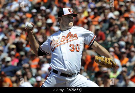 Le 15 juin 2014 - Baltimore, MD, États-Unis - Chris Tillman des Orioles de Baltimore affronte les Blue Jays de Toronto à Oriole Park à Camden Yards, à Baltimore, le dimanche 15 juin 2014. (Crédit image : © Algerina Perna/MCT/ZUMAPRESS.com) Banque D'Images