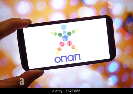 Pologne. 11 mars 2025. Dans cette illustration photo, le logo de la société OPAP est affiché sur l'écran d'un smartphone. (Crédit image : © Piotr SWAT/SOPA images via ZUMA Press Wire) USAGE ÉDITORIAL SEULEMENT! Non destiné à UN USAGE commercial ! Banque D'Images