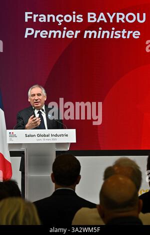 Lyon, France. 13 mars 2025. Le premier ministre François Bayrou visite le salon Global industrie à Lyon, France, le 13 mars 2025. Photo de Julien Reynaud/APS-médias/ABACAPRESS. COM Credit : Abaca Press/Alamy Live News Banque D'Images