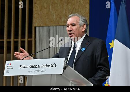 Lyon, France. 13 mars 2025. Le premier ministre François Bayrou visite le salon Global industrie à Lyon, France, le 13 mars 2025. Photo de Julien Reynaud/APS-médias/ABACAPRESS. COM Credit : Abaca Press/Alamy Live News Banque D'Images