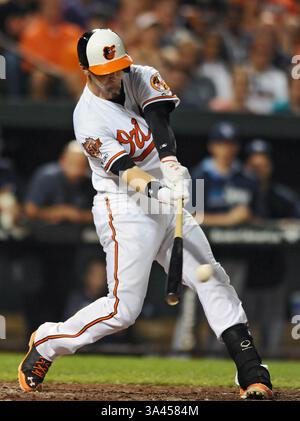 26 août 2014 - Baltimore, MD, États-Unis - Caleb Joseph de Baltimore Orioles se connecte pour un seul et conduire en deux points contre les Rays de Tampa Bay lors de la quatrième manche le mardi 26 août 2014, à Camden Yards à Baltimore. (Crédit image : © Kenneth K. Lam/MCT/ZUMA Wire) Banque D'Images