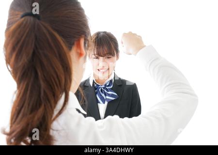 Les élèves se mettent en colère contre leur professeur Banque D'Images