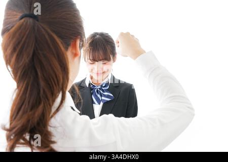 Les élèves se mettent en colère contre leur professeur Banque D'Images