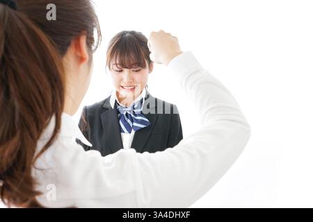 Les élèves se mettent en colère contre leur professeur Banque D'Images