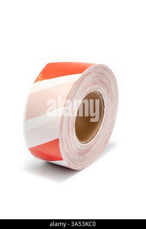 Rouleau vibrant de ruban adhésif décoratif avec des rayures rouges et blanches accrocheuses parfait pour l'artisanat, l'emballage cadeau et les projets Home d cor Banque D'Images