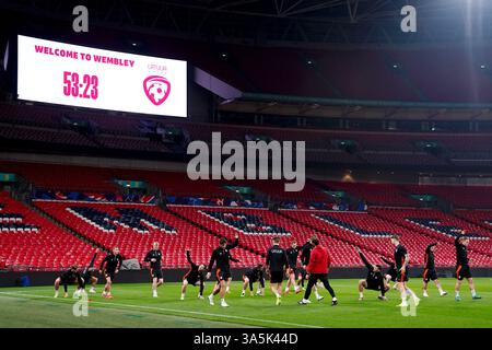 Les joueurs lettons lors d’une séance d’entraînement au stade de Wembley, à Londres. Date de la photo : dimanche 23 mars 2025. Banque D'Images