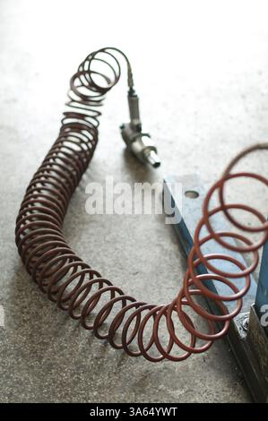 Wrenche avec flexible de l'air pneumatique Banque D'Images