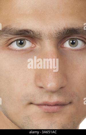 Le visage de jeune homme. Close up macro portrait Banque D'Images