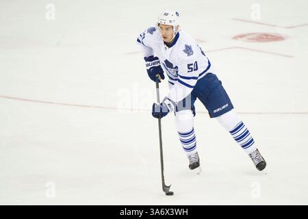 12 octobre 2014 : le défenseur des Maple Leafs de Toronto Stuart Percy (50) patine avec la rondelle pendant le match opposant les Rangers de New York et les Maple Leafs de Toronto au Madison Square Garden à Manhattan, New York . Les Maple Leafs de Toronto battent les Rangers de New York 6-3. Crédit obligatoire : Kostas Lymperopoulos/CSM (crédit image : © Kostas Lymperopoulos/Cal Sport Media/ZUMAPRESS.com) Banque D'Images