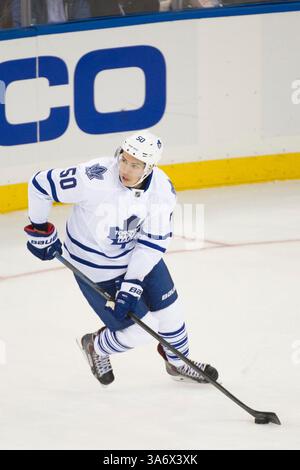 12 octobre 2014 : le défenseur des Maple Leafs de Toronto Stuart Percy (50) patine avec la rondelle pendant le match opposant les Rangers de New York et les Maple Leafs de Toronto au Madison Square Garden à Manhattan, New York . Les Maple Leafs de Toronto battent les Rangers de New York 6-3. Crédit obligatoire : Kostas Lymperopoulos/CSM (crédit image : © Kostas Lymperopoulos/Cal Sport Media/ZUMAPRESS.com) Banque D'Images