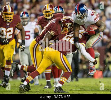 Dec. 03, 2012 - Landover, Maryland, États-Unis - le dos de course des géants de New York AHMAD BRADSHAW (44) court sur plus de 100 yards le lundi soir Football à FedEx Field. (Crédit image : © Tom Rothenberg/ZUMAPRESS.com) Banque D'Images