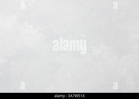 Fond de mur en plâtre texturé gris clair avec surface rugueuse abstraite, design minimaliste Banque D'Images