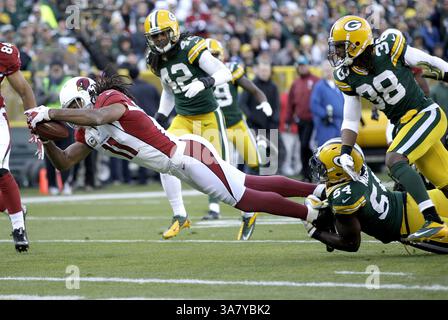 4 novembre 2012 - Green Bay, WI, États-Unis - Larry Fitsgerald des Cardinals de l'Arizona marque un touchdown contre Dezmon Moses des Packers de Green Bay dans le troisième quart-temps de leur match le dimanche 4 novembre 2012 au lambeau Field de Green Bay, Wisconsin. Les Packers de Green Bay battent les Cardinals de l'Arizona 31-17. (Crédit image : © John Klein/MCT/ZUMAPRESS.com) Banque D'Images